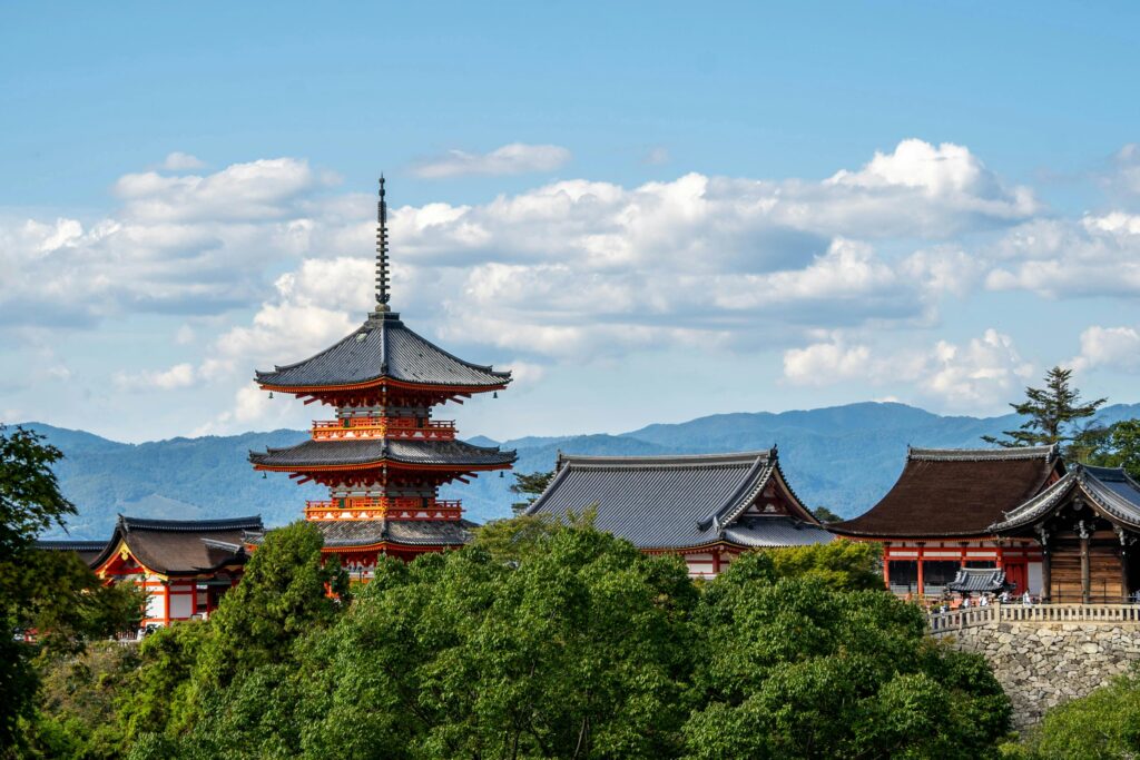 Kyoto scenery with a temple and pagoda.