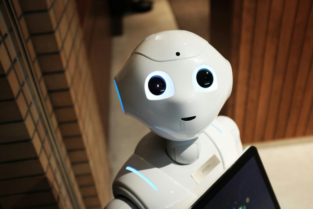 A robot assistant fitted with a tablet looks at the camera